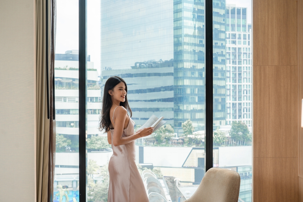 ผู้หญิงอยู่อาศัยในคอนโดห้อง Duplex